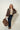 model in a shearling leather brown jacket by leather jennifer tattanelli